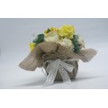 Lemon Peonies, Roses and Yellow Tiger Lillies with Leaves in Hesian Covered Pot
